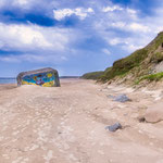 ...ein Bunker aus dem 2ten Weltkrieg viel auf den Strand