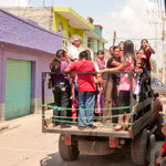 Rudi with a truck load of girls on the way to the function