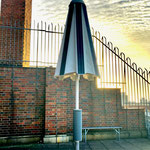 Solar umbrella half open