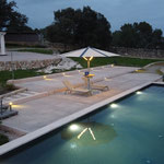 Pool illuminated with umbrella