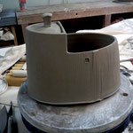 I finish of a lid and attach a slab to the bottom for the finished piece