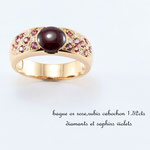 bague or rouge , cabochon rubis, pavage saphirs et diamants