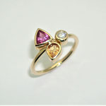 bague or jaune , diamant, saphir jaune et rubis