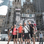 Pilgrims in front of the cathedral façade restoration site on Obradoiro square