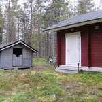 Firewood shed and the separate entrance to the storage building