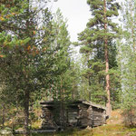 own campsite with a log construction 