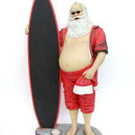 figura santa claus con tabla de surf