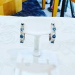 K18WGアクアマリン・ダイヤピアス　Ａ：0.26ct　D：0.18ct　直径：13mm　幅：2.5mm　￥92,000（税込）