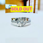 Ptダイヤメンズリング　D：0.318ct（E･SI-1・VG）・0.230ct　重量：14.7g　現行サイズ：18番　￥398,000（税込）