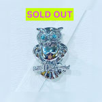 K18WGパライバトルマリン・ダイヤブローチ　T：0.07ct　D：0.05ct　外径：約2.5cm×1.8cm　￥83,000（税込）