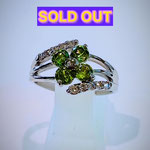 Ptデマントイドガーネット・ダイヤリング　G：0.81ct　D：0.12ct　地金重量：5.47g　現行サイズ：12番　¥220,000（税込）