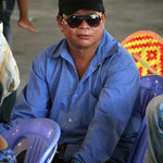 Visitor of a traditional Muay Thai Boxing event, Phnom Penh / Cambodia, Copyright © 2011