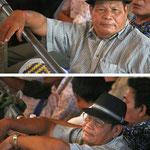 Visitor of a traditional Muay Thai Boxing event, Phnom Penh / Cambodia, Copyright © 2011