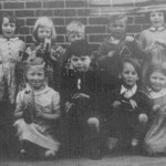 Dolphin Lane Infants. Jean Mercer is far right on the back row as we look