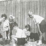 Miss King's class, 1939: learning about frogs (thanks to Brenda Nicolle, who is crouching by the fence). left to right are Bill Roberts, Jean Holt,  Gareth Edwards, Brenda Nicolle, and John ?