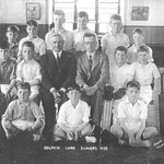 Cricket Team, 1938-9. Rear row: Cyril Woolley, Harry Bird, les Dale, Don Layfield, Stanley Silver; middle row: Thomas Brown, Ron Bowyer, Mr Sutton, Mr Walters, Arthur O'Hare, Robert Wardle; front row: Harold Mitchell, Robert Harris, Victor Spencer