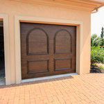 Many styles of Garage Doors can be enhanced with a Faux Wood Finish