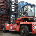 empty-container handler Kalmar DCE90-45E6 can lift 9 tons 6 containers high, 2 units available one unit year 2006 and a second unit year 2007