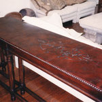 Created hand dyed leather console table top with custom embossing and nail head trim