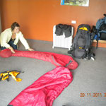 Magda trys to bunch the sleeping bag together