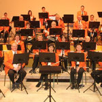 2009 : A l'occasion de son concert de sainte cécile, à Notre Dame de Cenilly le samedi 21 novembre, les musiciens de l'UMCH posent pour le calendrier 2010.
