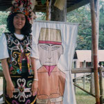 Wearing a Traditional Costume at the Sarawak Cultural Village
