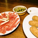 Tapas - Excuse an olive seed.