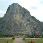 Buddha Image Cast By Laser Beams on the Khao Chi Chan Cliff