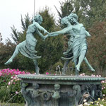 The Statue of Three Young Girls Dancing on the Way to the Train Station