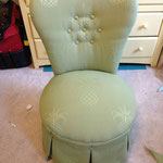 Upholstered vanity chair with box pleat skirt with buttons