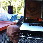 Tony begins sculpting a Charlie keychain based off Jason's new logo concept.  