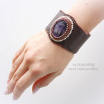 95e.Fashion Jewellery Design  by " FLAUNDER"     Bracelet by FLAUNDER «Amethyst Chocolate» with natural amethyst and milk crystals. The bracelet is made with the technique of beadwork on the natural leather (beadwork).