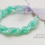 35€. Delicate set of mint color of Japanese glass beads by FLAUNDER