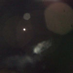 11. Der 2te Januar 2010. Voller Hingabe, fotografiere ich dem Mond.