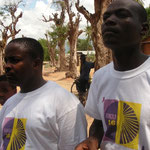 Field Officer Bernard (left) and driver Lukas (right) on inauguration ceremony for 16 day´s campaign against gender violation in Kihurio