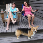 Leslie and Kim and Luna on the deck of our Cabin
