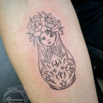 matroesjka fineline tattoo lowerarm