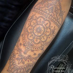 ornamental mandala fineline tattoo feminine