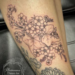 forget me not flowers floral leg tattoo fineline
