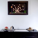 Cuadro Esferas en color crudo con marco en chocolate decorado $ 1250.00