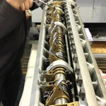 closing housing for bronze grippers on gripper pad comb bar