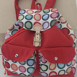 Sac à dos en tissu jacquard ronds rouges et coton rouge uni