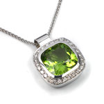 Herrlicher Peridot - eingefaßt in Weißgold mit Brillanten