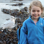 Sarah with a local, Robin Hood Bay.