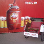 Promotie Amstel Tapje, reclamebord en wielkastbestickering voor VIP-vervoer in stijl