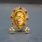 1o - Spilla-ciondolo Miniatura dipinta a mano su avorio lavorazione madrevitato in oro e rubini 