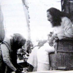 Shireenmai washing Baba's feet at the celebration of his 43rd birthday in 1937 at Nasik