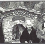 The Haefligers with Mark Lutz ( left ) at the shrine of Bruder Klaus