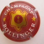 Marque : BOLLINGER N° Lambert : 26b Couleur : Bordeaux, or foncé.Lettres fines Description : Blason contenant une Ètoile filante† Emplacement : 014-03-02