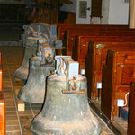 Three bells stored in the main aisle